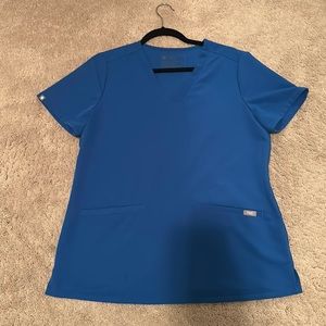 Royal blue figs scrub top. Size M. $20 each. Have 2 available!